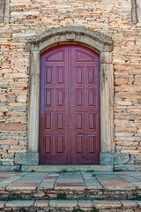 old wooden door in a stone wall