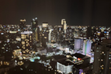Abstract blur cityscape skyline building night light bokeh background