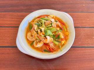 Stir fried shrimp with salted egg, famous delicious Thai food. Thai seafood recommend menu 