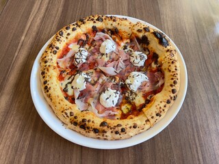 Truffle Burrata Prosciutto homemade pizza. Delicious Italian food. Pizza 