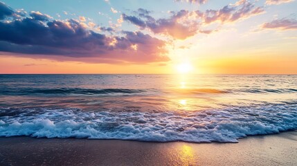 Obraz premium Breathtaking sunset over the ocean waves creating a tranquil beach atmosphere : Generative AI