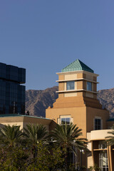 Afternoon sun shines on the buildings of the downtown skyline of Burbank, California, USA.