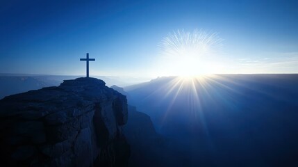 Obraz premium Cross Silhouette Sunburst Over Grand Canyon Landscape