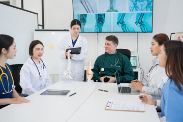 Fototapeta premium Hospital medical team meetings and discussions about surgery, and medical staff working together in a clinic conference room.