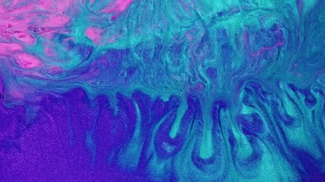 Abstract video with swirling neon pink, blue and purple paint on black background, dynamic movement in the style of watercolor texture with fluid shapes and vibrant colors.