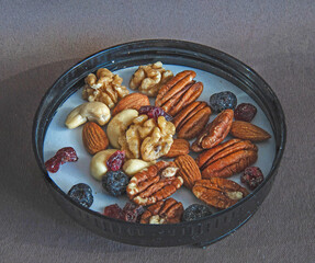 mix of nuts and berries in a plate