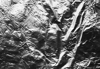 Closeup plastic vinyl torn wrap textures. Vector illustration show various crinkled, wrinkled, and transparent plastic wraps with different tear patterns. Ideal for design overlays and shadow effect.