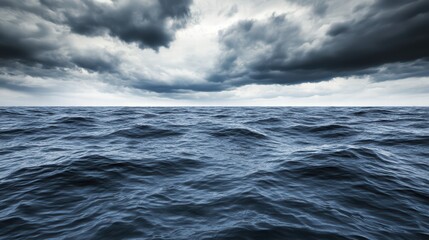 Fototapeta premium Dramatic Cloudy Sky Over Calm Dark Ocean Water Surface