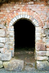 Door in an Old Abandoned Industrial Brick Wall – Urban Decay Scene
