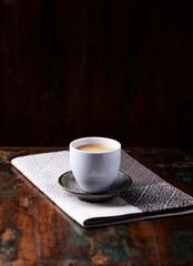 Cup of coffee on wooden background. Soft focus. Copy space.	