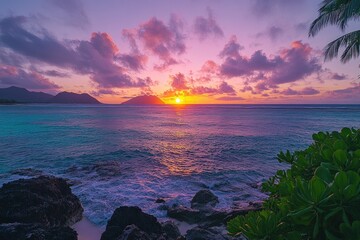 Vibrant sunset over the ocean with rocky shore, palm trees, and distant mountains in the background