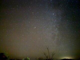 01. Stunning views of the Milky Way galaxy stretching across the night sky, showcasing the beauty of the cosmos