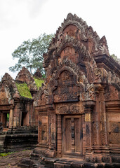Naklejka premium The libraries at Banteay Srei, the Citadel of Women, a red sandstone Hindu temple in Angkor, Cambodia