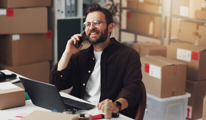 Phone call, happy man and logistics in office, business and listening to supplier for inventory in...