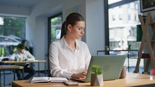 Troubled manager working office open space closeup. Unhappy businesswoman