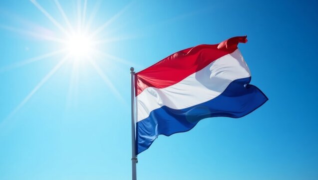 Dutch flag waving in the sun.
