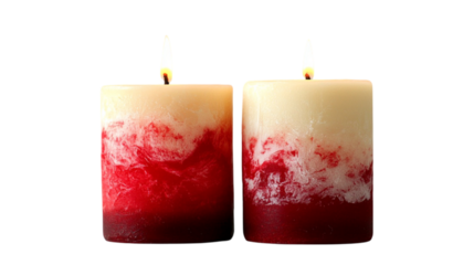 Two lit red and cream swirl candles burning brightly