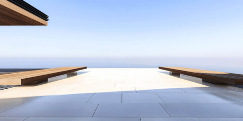 Modern terrace overlooking serene ocean view during clear day in tranquil setting