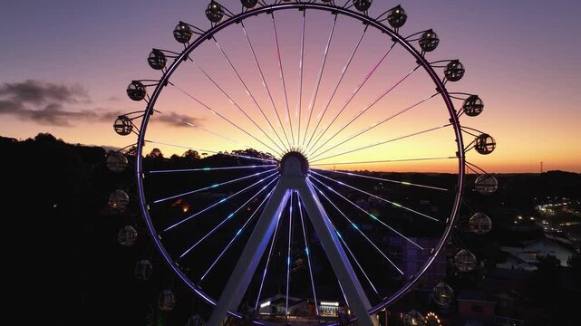 Stunning Ferris Wheel At Canela In Rio Grande Do Sul Brazil. Illuminated Ferris Wheel. Landmark Building. Sunset Scenery. Canela Brazil. Stunning Ferris Wheel At Canela In Rio Grande Do Sul Brazil.