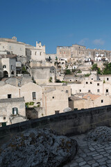 Naklejka premium Exterior aerial architecture and design at 'MATERA' Italian ancient cave dwellings inhabited since the Paleolithic, UNESCO World Heritage Site- Italy