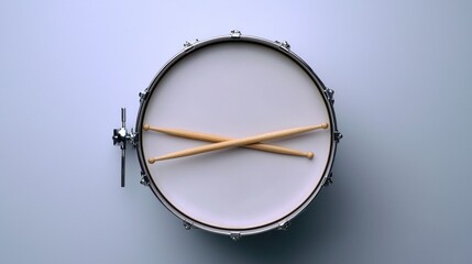Overhead view of drum set with crossed sticks on light gray background