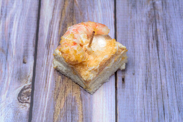 prawn canape on wooden table