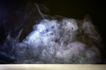 White smoke or fog flowing across the floor creates a mysterious and ethereal atmosphere.