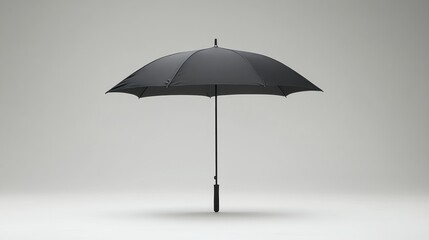 Obraz premium Black umbrella on a neutral background, studio shot, product display, promotional use