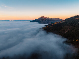 Misty morning in Liptov region with High Tatras mountains around. Liptovsky Mikulas landspace, slovakia.