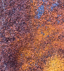 A close up of a pile of rocks with a yellowish brown color