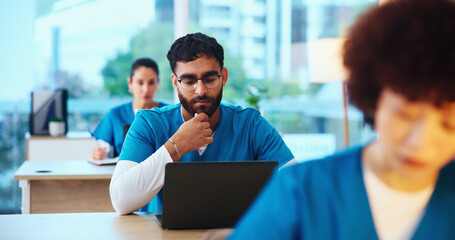 Healthcare, laptop and man with test, medical school and studying for knowledge, students or...