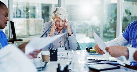 Frustrated woman, headache and doctor with documents for overworked stress or anxiety at hospital....