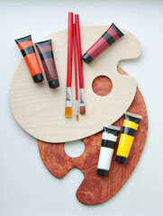 Artistic Painting Tools with Colorful Acrylic Paints and Brushes