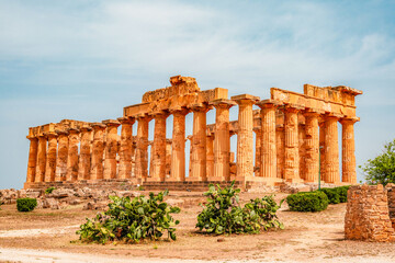 Fototapeta premium Greek temples at Selinunte of Temple of Hera Temple E with ruins of Greek columns in Selinunte Archaeological Park Sicily Italy