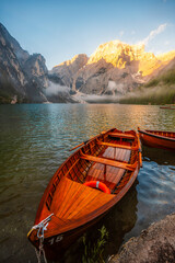 Fototapeta premium Lago di Braies or Pragser Wildsee lake with boats and fishing dock.Fanes-Sennes-Braies national park in Dolomiti Alps, South Tyrol, Italy