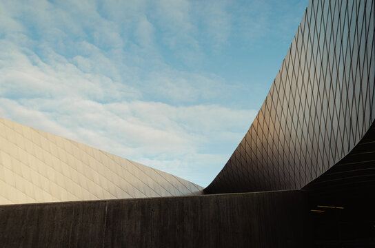 sloped architecture facade with blue sky