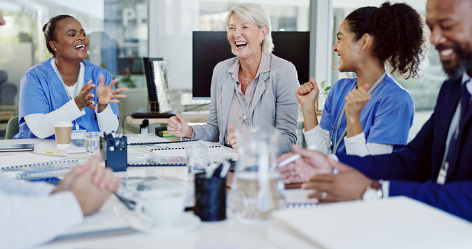Business people, doctor and meeting with team in celebration for medical discovery or success at hospital. Group, healthcare employees or happy colleagues with smile or fist pump for health program