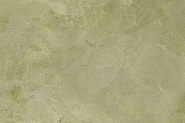 Texture of golden decorative plaster or concrete. Grunge background for design.