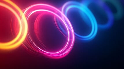 Luminous circles in a spectrum of colors against dark backdrop