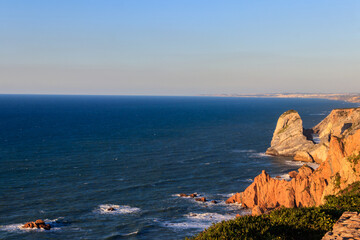 View of the Atlantic Ocean from Cabo da Roca. Cabo da Roca or Cape Roca is westernmost cape of mainland Portugal, continental Europe and the Eurasian land mass