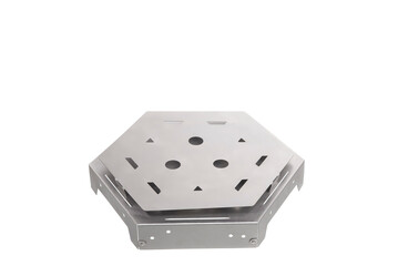 Detailed shot of a hexagonal stainless steel fire pit component, showcasing circular and triangular ventilation cutouts, isolated on white.