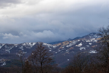 Fototapeta premium Mountain landscape of winter and fog, 