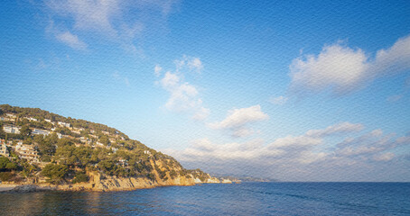 Beautiful blue sky with a few clouds and a calm ocean