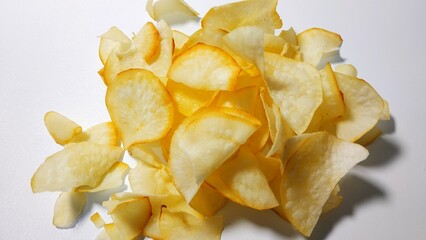 Cassava chips or cassava chips are a snack made from cassava which is sliced ​​and then fried....