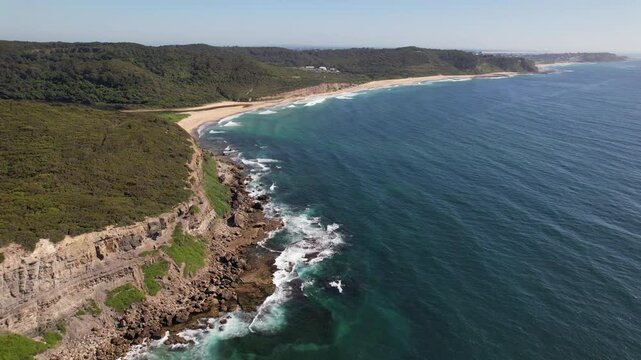 Glenrock Beach And Little Redhead Cliff Top Walk In NSW, Australia - Aerial Pullback