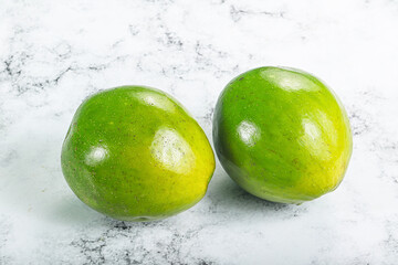 Two ripe green exotic avocado fruit