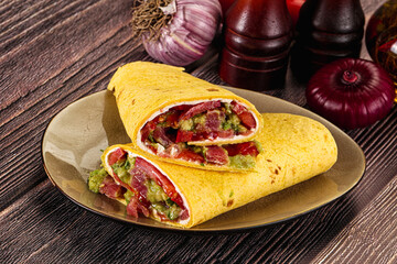 Burrito with tuna and vegetables wrap