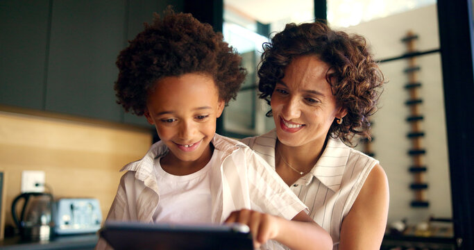 Tablet, mother and child care for education in home, e learning and support with knowledge. Mom, son and website for streaming entertainment in kitchen, love and happy family for bonding together