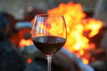 A glass of red wine is a beautiful background for serving