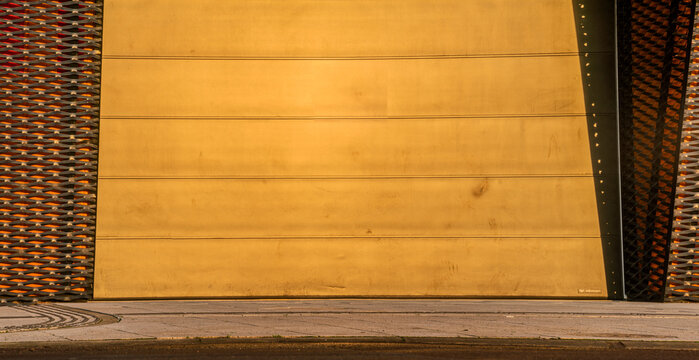 Garage door and entrance to futuristic building